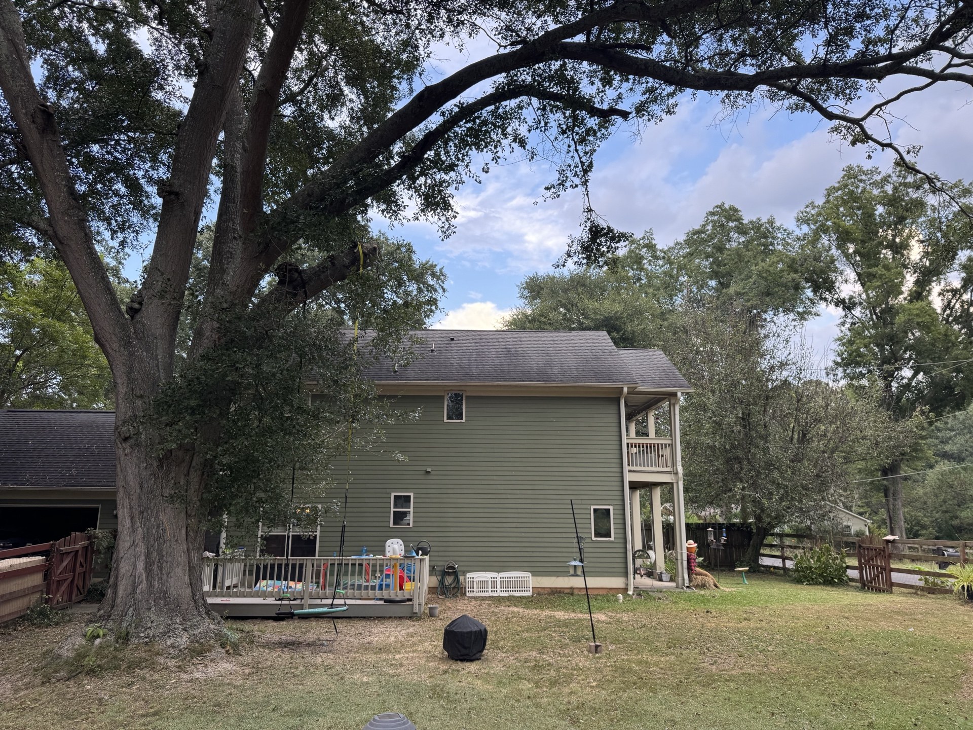 After: Snapped oak branch safely lowered with the deck and house protected in Acworth GA